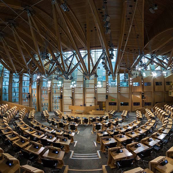"Scottish Parliament Debating Chamber 2" by Colin is licensed under CC BY-SA 4.0.